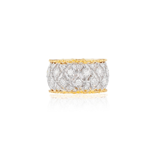 79 - BUCCELLATI: A DIAMOND RING  Of bi-coloured design, formed as a continuous openwork foliate lattice, ... 