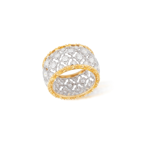 79 - BUCCELLATI: A DIAMOND RING  Of bi-coloured design, formed as a continuous openwork foliate lattice, ... 