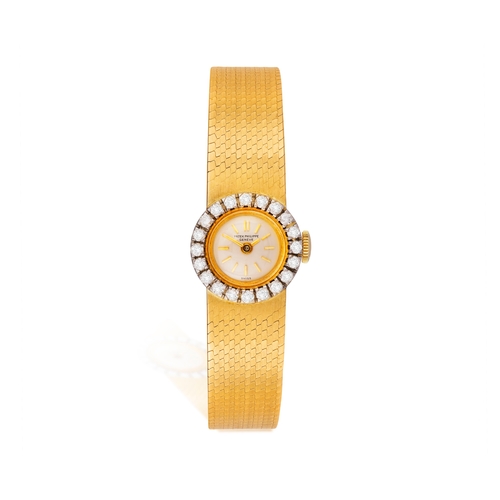 86 - PATEK PHILIPPE: A LADY'S 18K GOLD AND DIAMOND COCKTAIL WATCH, CIRCA 1960  20-jewel manual wind movem... 