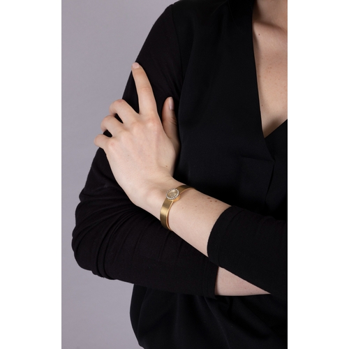 86 - PATEK PHILIPPE: A LADY'S 18K GOLD AND DIAMOND COCKTAIL WATCH, CIRCA 1960  20-jewel manual wind movem... 