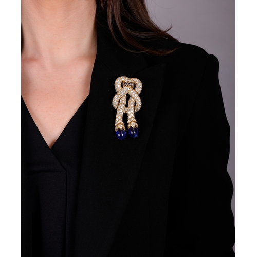 89 - RENÉ BOIVIN, DESIGNED BY JULIETTE MOUTARD: A RARE AND COLLECTIBLE SAPPHIRE AND DIAMOND 'NOEUD DE PAS... 