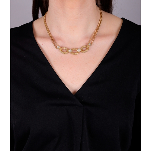 93 - BOUCHERON: A DIAMOND 'SERPENT BOHÈME' PENDANT NECKLACE, CIRCA 1970  The pendant composed of three ov... 