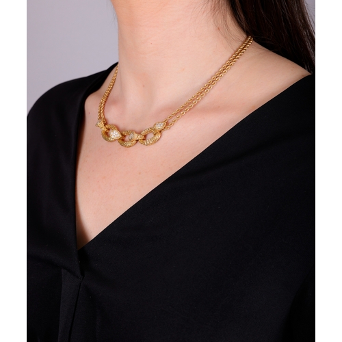 93 - BOUCHERON: A DIAMOND 'SERPENT BOHÈME' PENDANT NECKLACE, CIRCA 1970  The pendant composed of three ov... 