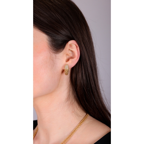 94 - BOUCHERON: A PAIR OF DIAMOND 'SERPENT BOHÈME' EARCLIPS, CIRCA 1970  Each pear-shaped plaque pavé-set... 