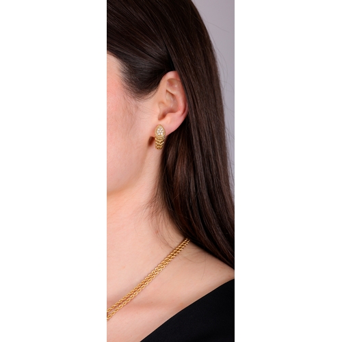 94 - BOUCHERON: A PAIR OF DIAMOND 'SERPENT BOHÈME' EARCLIPS, CIRCA 1970  Each pear-shaped plaque pavé-set... 
