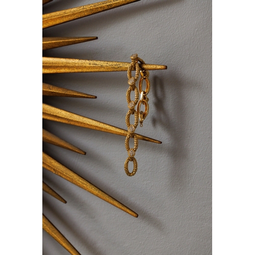 95 - BOUCHERON: A DIAMOND 'SERPENT BOHÈME' BRACELET, CIRCA 1970  Composed of a series of oval-shaped text... 