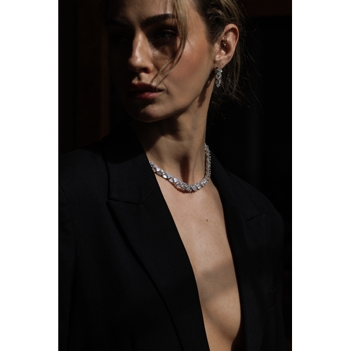 96 - ATTRIBUTED TO HARRY WINSTON: A FINE DIAMOND DEMI-PARURE, CIRCA 1970

* No internet bidding *

Compos... 