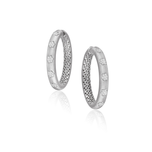 98 - A PAIR OF DIAMOND HOOP EARRINGS   Each sati-finished white gold hoop, embellished with five flowerhe... 