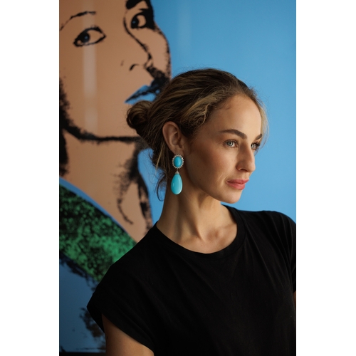 99 - A PAIR OF TURQUOISE AND DIAMOND PENDENT EARRINGS  Each turquoise drop with brilliant-cut diamond cap... 