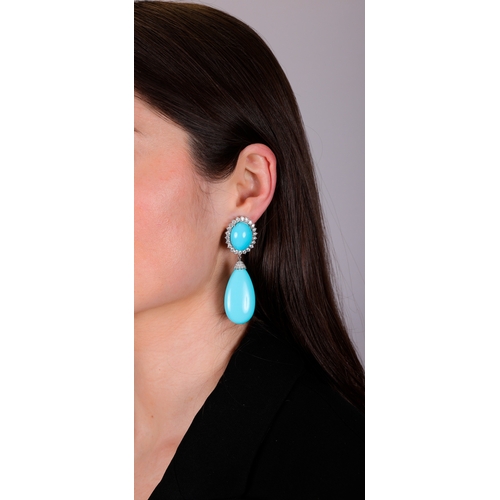 99 - A PAIR OF TURQUOISE AND DIAMOND PENDENT EARRINGS  Each turquoise drop with brilliant-cut diamond cap... 