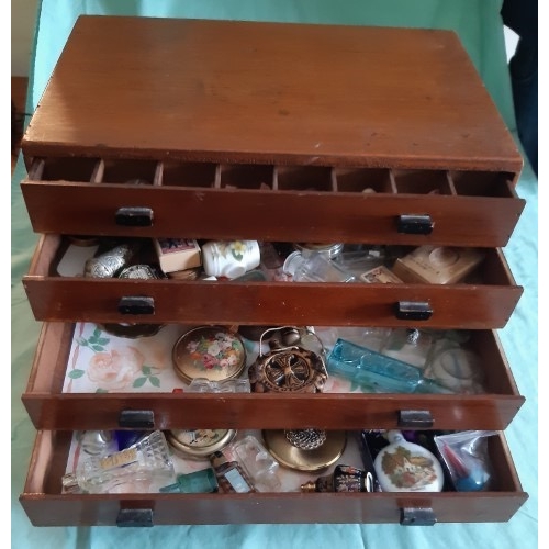 120 - Five drawer collector's cabinet with various contents to include vintage cosmetics, perfume bottles ... 