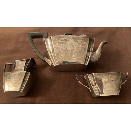 144 - A small HM silver tea set by William Hutton and Sons, London with non-conforming date letters G.H. &... 