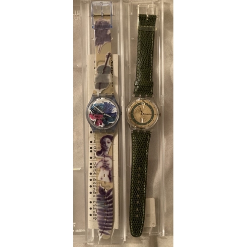 79 - Two as new Swatch watches, one music themed strap, one with crocodile effect strap.