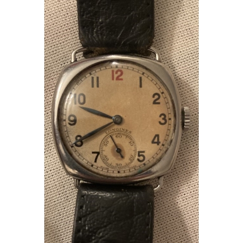 82 - A retro Longines gents' wrist watch with secondhand dial, stainless steel case.