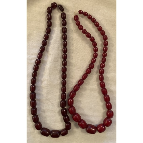 94 - Two early red coral bead necklaces, each 68cm L.