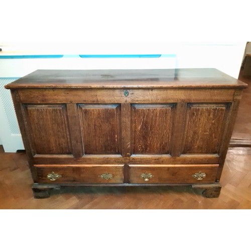 30 - An 18th century oak mule chest with earlier internal carved panel (one handle loop missing). approx.... 