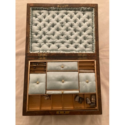 36 - Early burr walnut sewing box and contents with quilted lining, 30cm W x 23cm L x 13cm D.