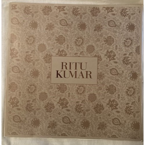 63 - A Rita Karmu designed, as new scarf in original presentation packaging. 100cm square.