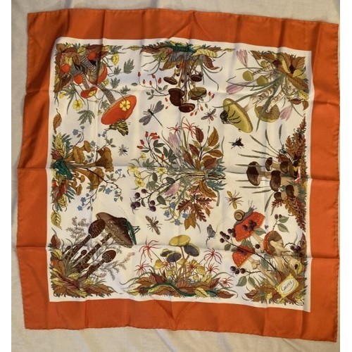 65 - A 1970's Gucci silk scarf, depicting insects, fungi and floribunda in original Hermes pouch and Herm... 