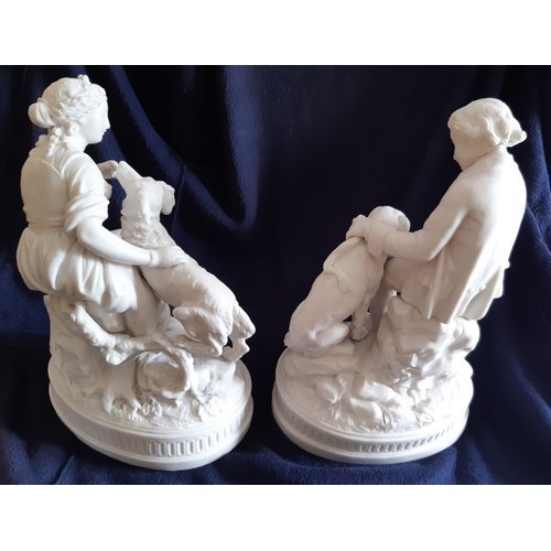 68 - Pair of Parion ware figurines, master and mistress with hounds, 38cm H approx.