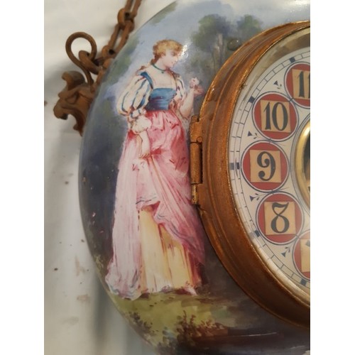 70 - A ceramic hand painted wall clock, missing top decorative garniture, 30cm D approx.