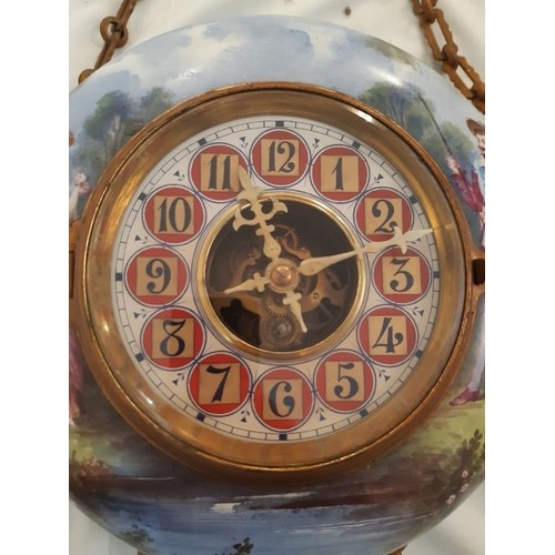 70 - A ceramic hand painted wall clock, missing top decorative garniture, 30cm D approx.