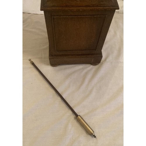 72 - Early to mid 20th century oak cased chiming granddaughter clock, striking on the gong.