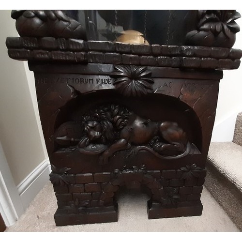 76 - 1920’s Black Forest long cased clock with a somewhat rare carving of William Tell to the top, seated... 