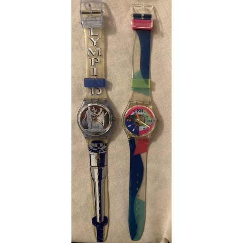 77 - Two as new Swatch watches Olympic Games Atlanta 1996 plus one other pink and green design.