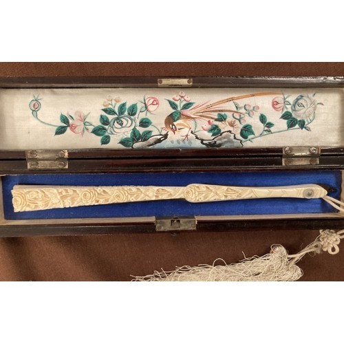 123 - Early oriental fan embroidered in silk with birds and flowers in fitted case