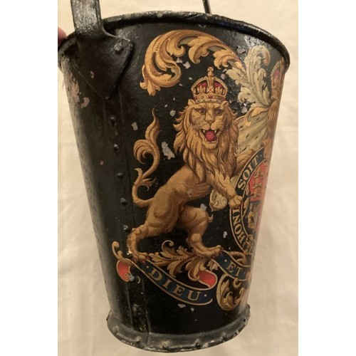 133 - Early metal fire bucket with heraldic crest of unknown family motto reads 'Honi shot Male sense' and... 