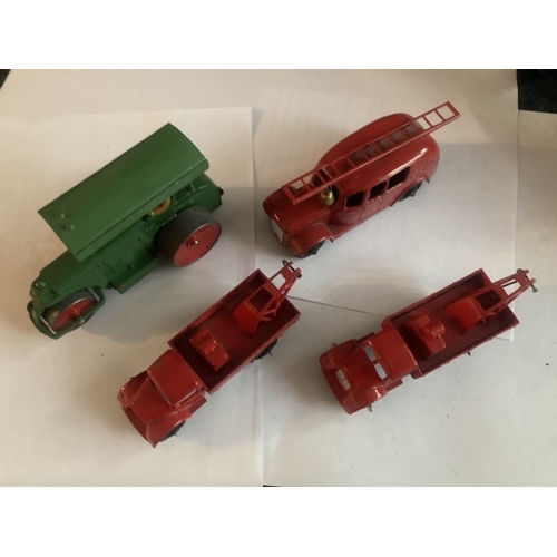 444 - A collection of four early Dinky Meccano model vehicles - road roller, Streamlined fire engine and t... 