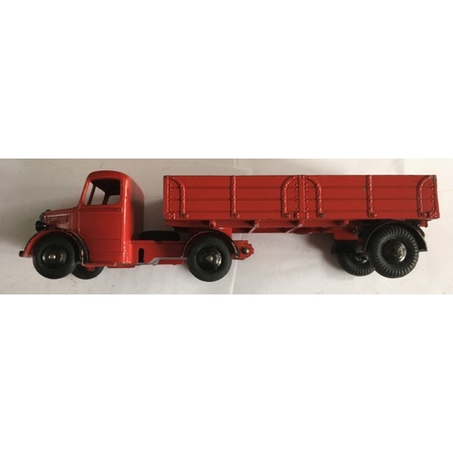463 - An early boxed Dinky Meccano Bedford articulated lorry in red. Model No. 521. Condition as photograp... 