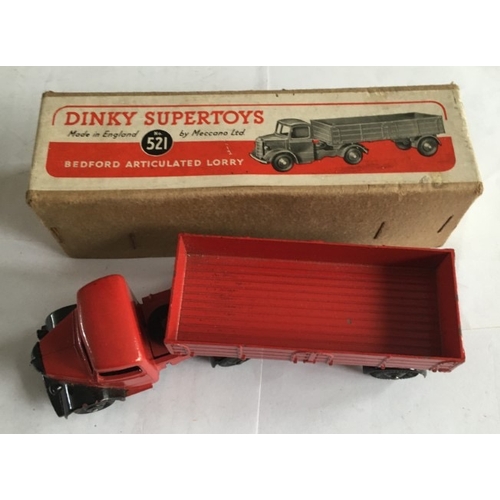 463 - An early boxed Dinky Meccano Bedford articulated lorry in red. Model No. 521. Condition as photograp... 