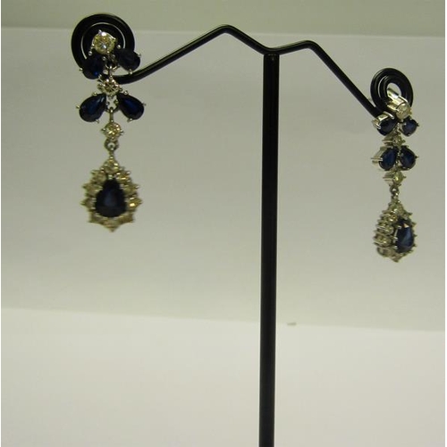 192 - A pair of Diamond and Sapphire set drop earrings