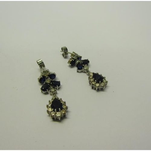 192 - A pair of Diamond and Sapphire set drop earrings