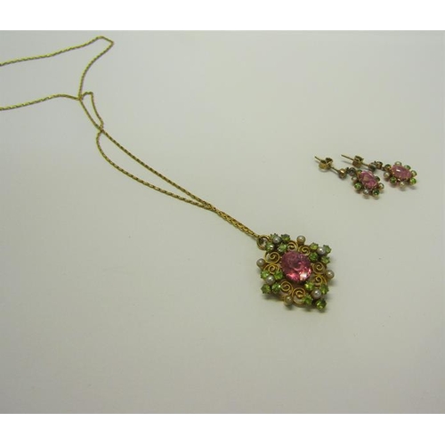 194 - An 18ct gold Pink Sapphire and Seed Pearl pendant necklace together with earrings.