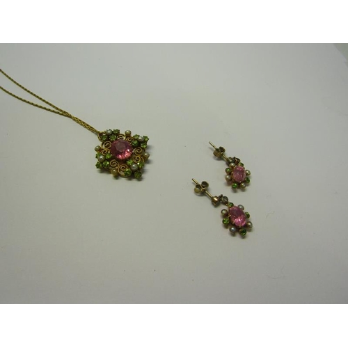 194 - An 18ct gold Pink Sapphire and Seed Pearl pendant necklace together with earrings.