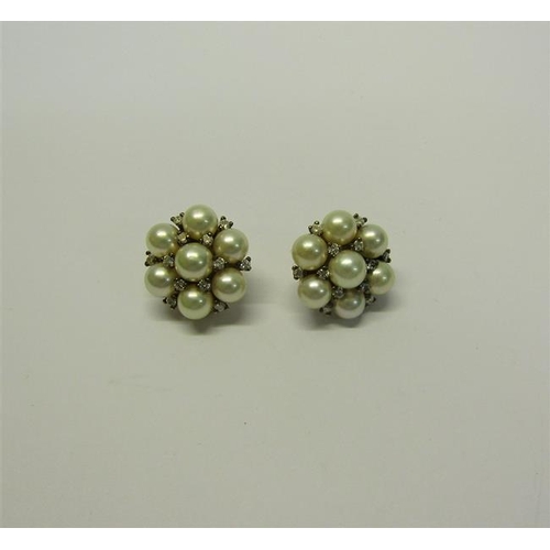 205 - A pair of gold Pearl and Diamond set earrings