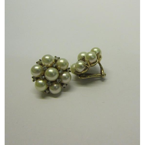 205 - A pair of gold Pearl and Diamond set earrings