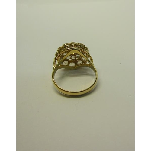 208 - A gold Diamond cluster ring - ring size O/P