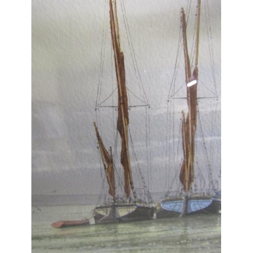 467 - Alan Whitehead - beached sailing vessels at the quayside, watercolour.  Signed, framed and glazed 25... 