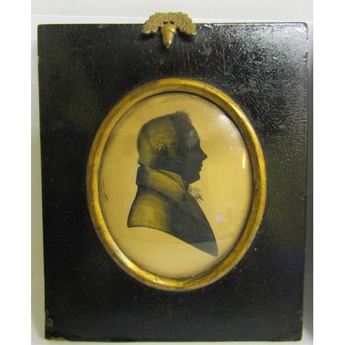 122 - Two 19c black on white silhouette portraits of gentleman, oval framed and glazed.  8.5cms x 7.5cms.