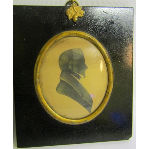 122 - Two 19c black on white silhouette portraits of gentleman, oval framed and glazed.  8.5cms x 7.5cms.