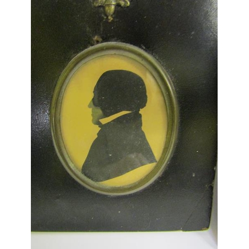 123 - Two 19c black on white silhouette portrait miniatures of gentleman.  Oval framed and glazed.  7cms x... 