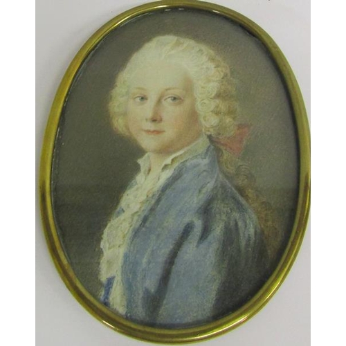 126 - Early 19c portrait watercolour miniature of a young gentleman with ribbon in his hair. Oval framed a... 