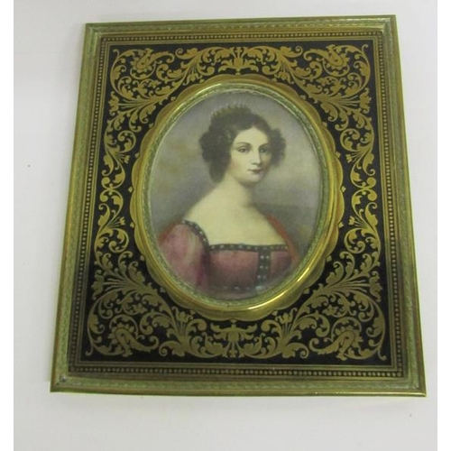 127 - A portrait miniature of a lady wearing a tiara in an oval brass frame.  6.5cms x 8.5cms.