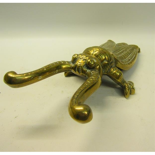 53 - A late 19c cast brass beetle boot pull 28cm l.