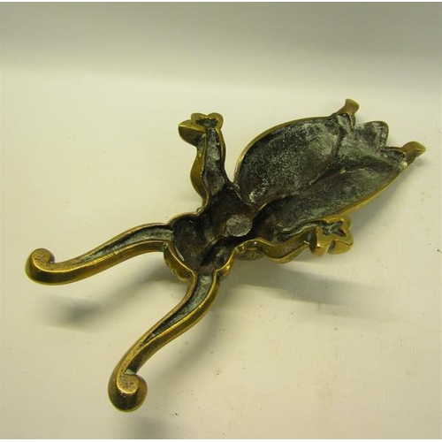 53 - A late 19c cast brass beetle boot pull 28cm l.