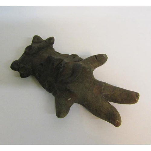 71 - A pre-Colombian pottery figure in standing pose with outstretched arms.  12.5cms h.